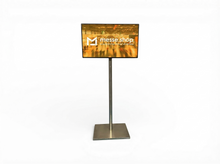 messe.shop 43 inch Full HD screen on a silver stand, ideal for trade shows and events.