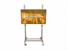 messe.shop 55" white interactive multitouch screen on a silver stand with wheels, ideal for trade shows and events.